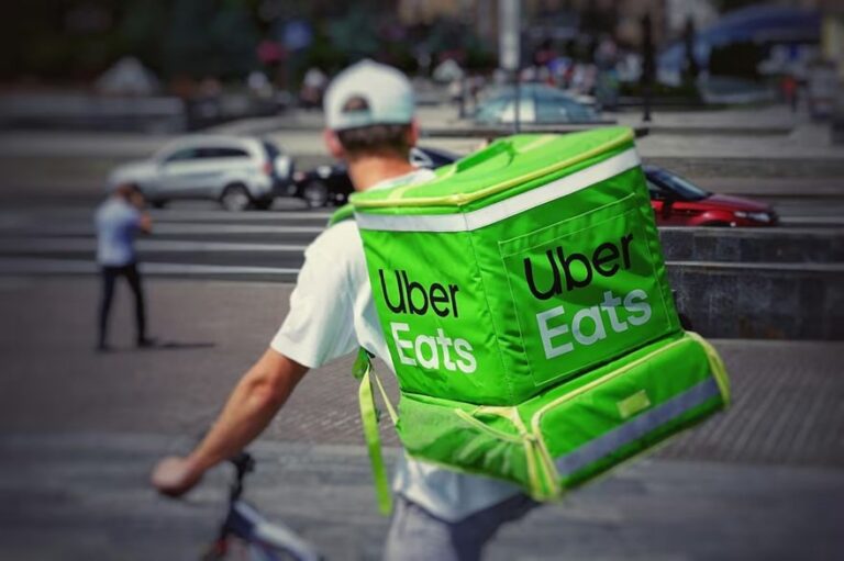 Logo de Uber y Pedidos Ya
