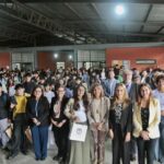 Autoridades educativas y representantes de UNICEF durante la entrega de libros en la Escuela Secundaria Blas Parera