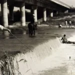 Vista del río Salí en Tucumán con aguas contaminadas y residuos en sus márgenes